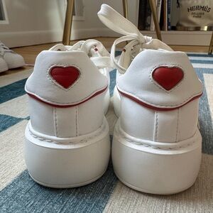 White Sneakers with Red Heart Detail by Nothing New